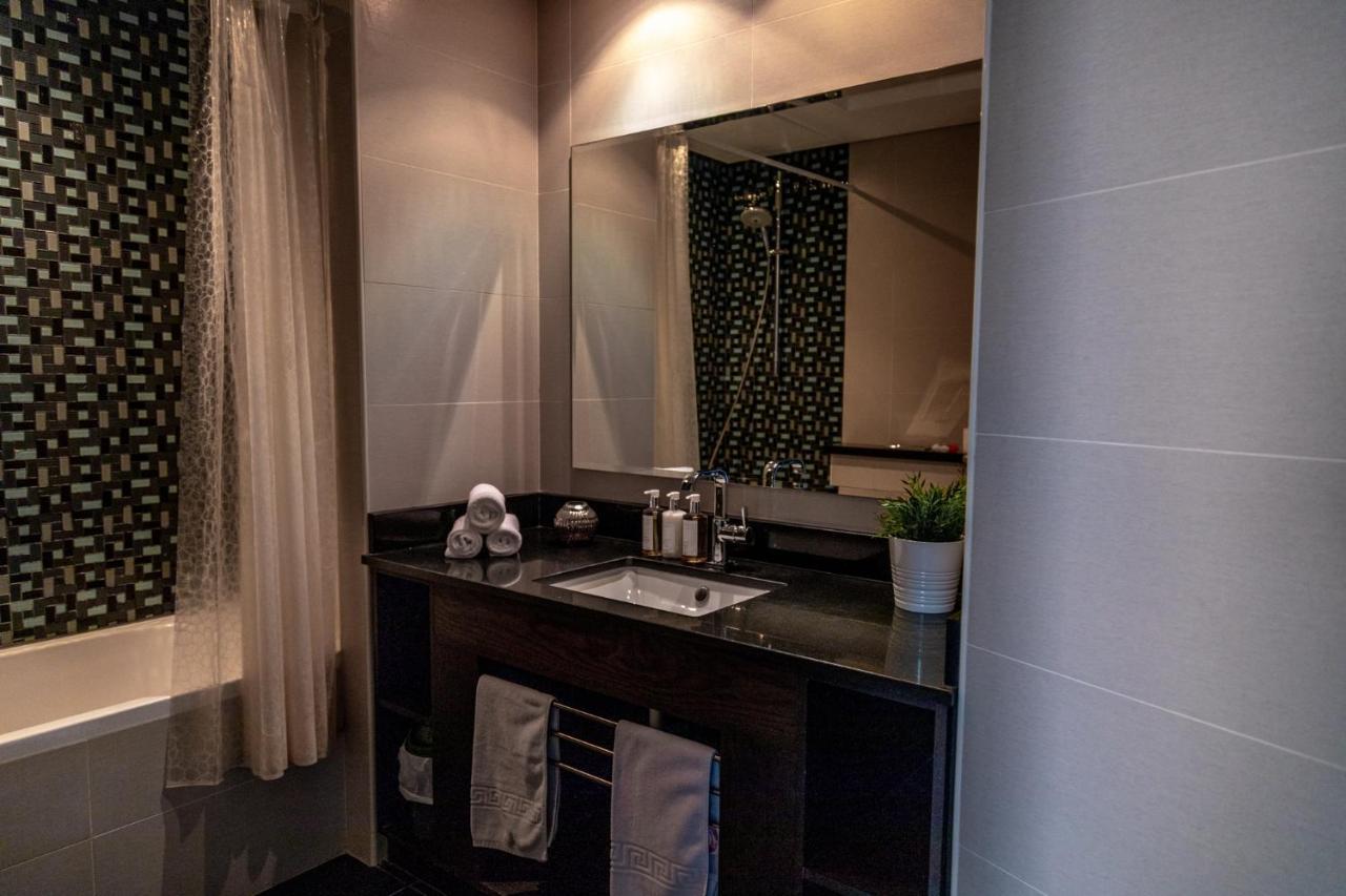 Nasma Luxury Stays - Cayan Tower Дубай Экстерьер фото